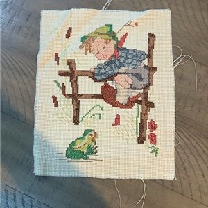 cross stitch finished embroidery little boy, climbing a fence catch frog